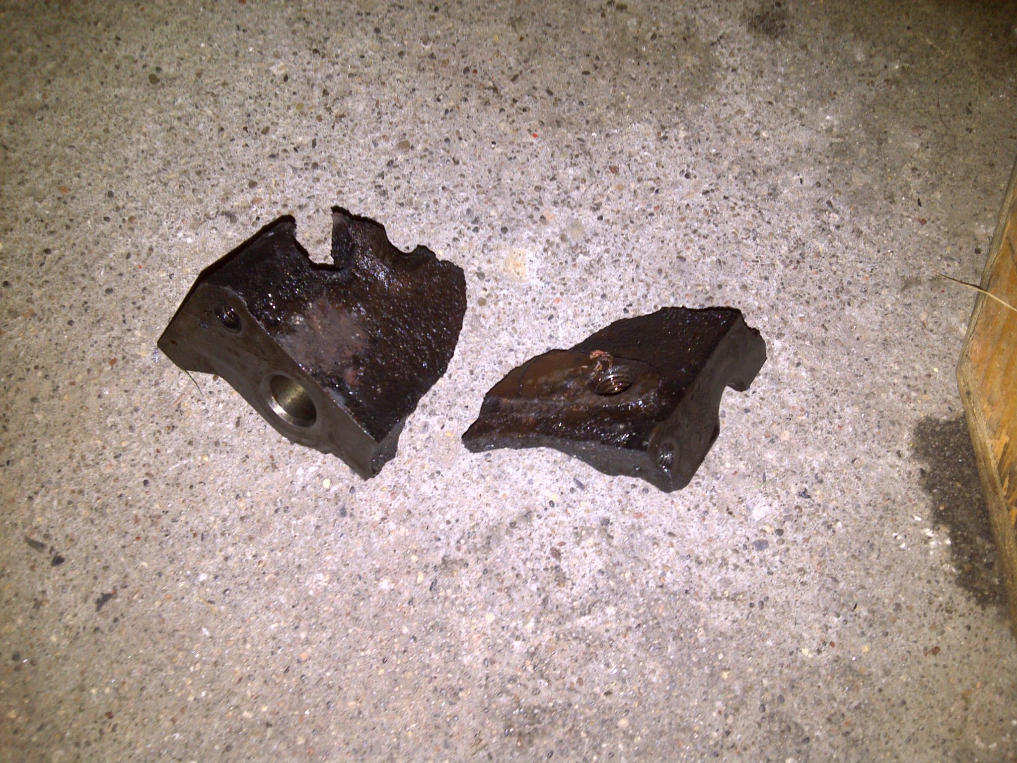 Two Pieces of Engine Block that broke off