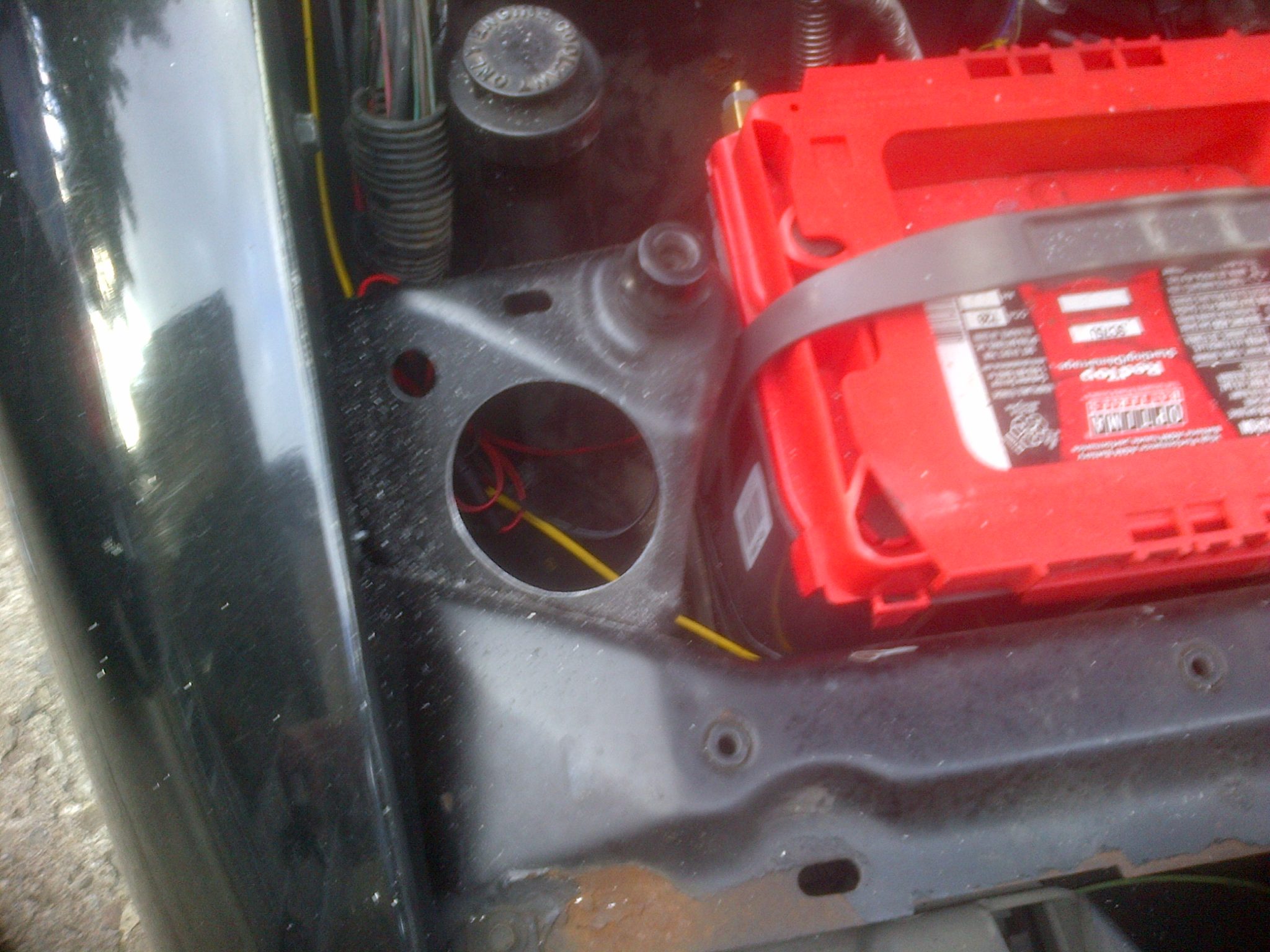 Passenger side hood support