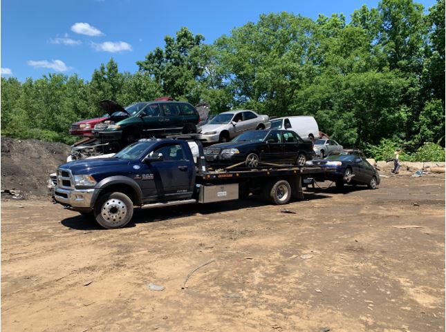 junk yard scrapping cars